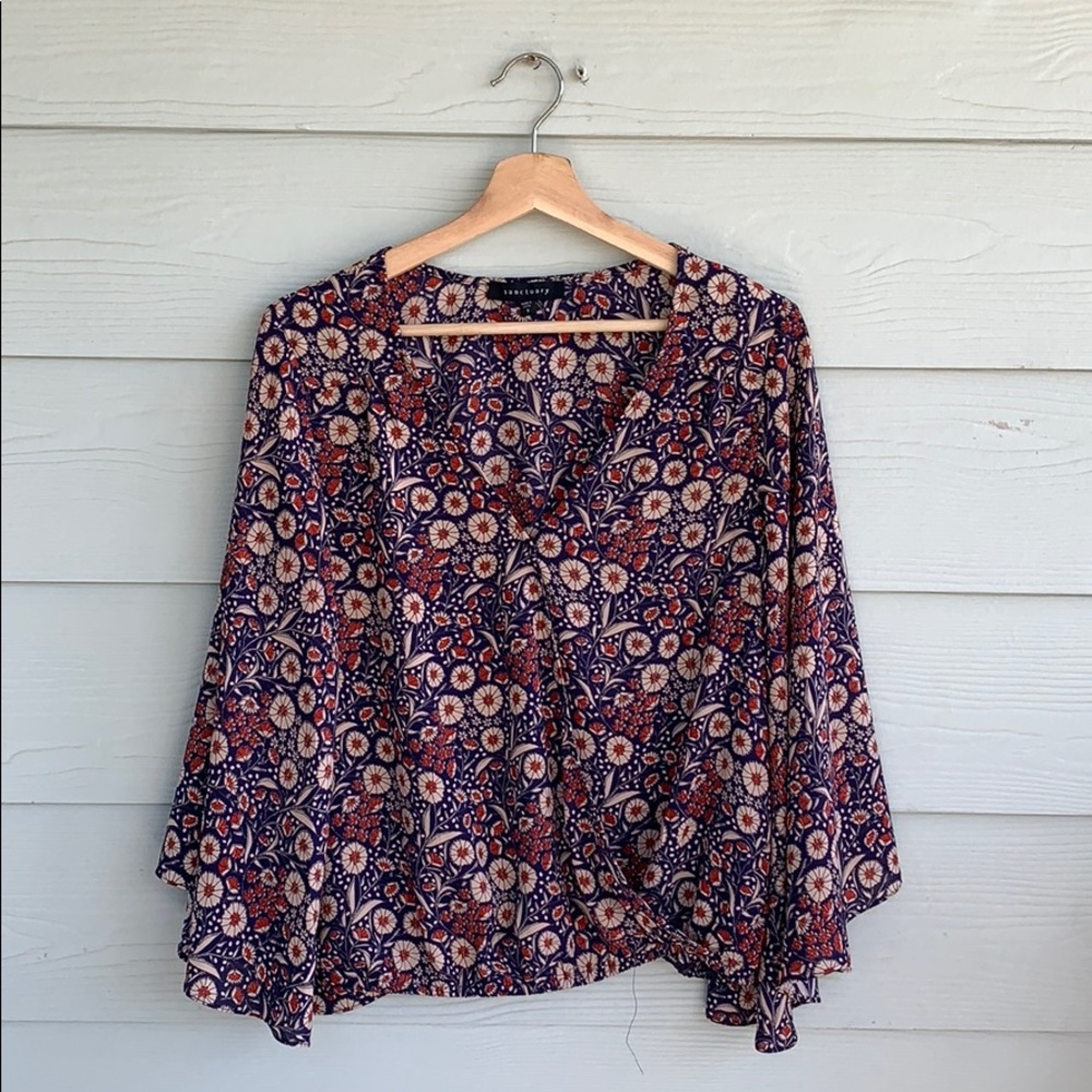 Anthropologie wrap top | size S